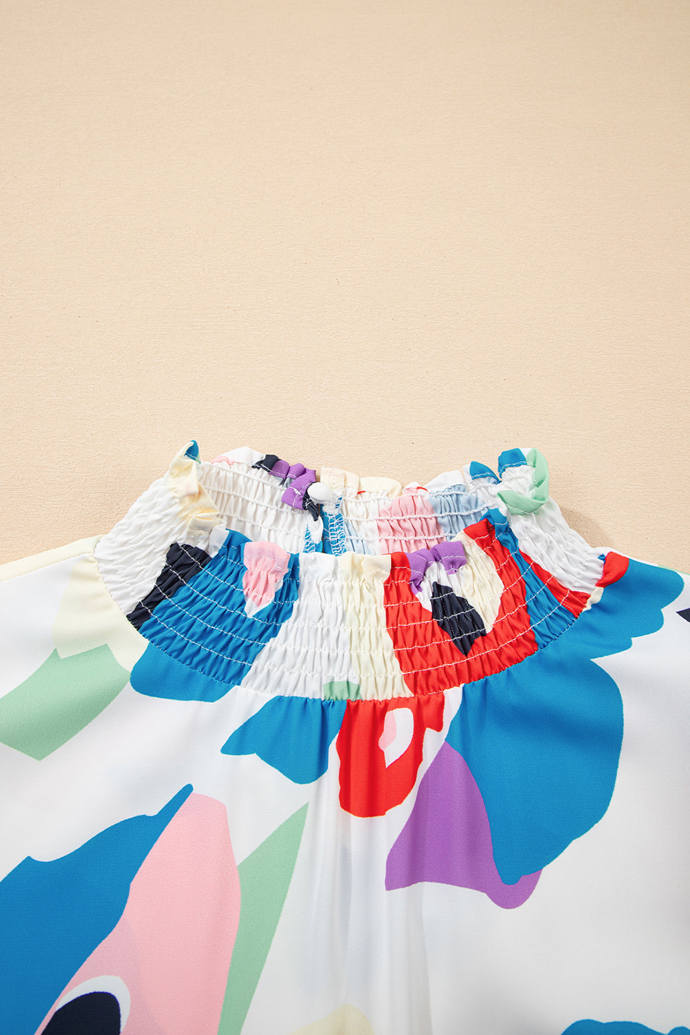 Dani Ruffle Sleeve Smocked Blouse