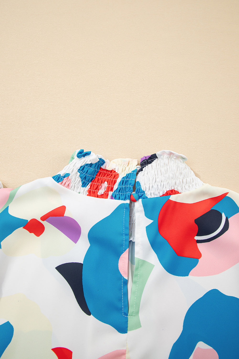 Dani Ruffle Sleeve Smocked Blouse