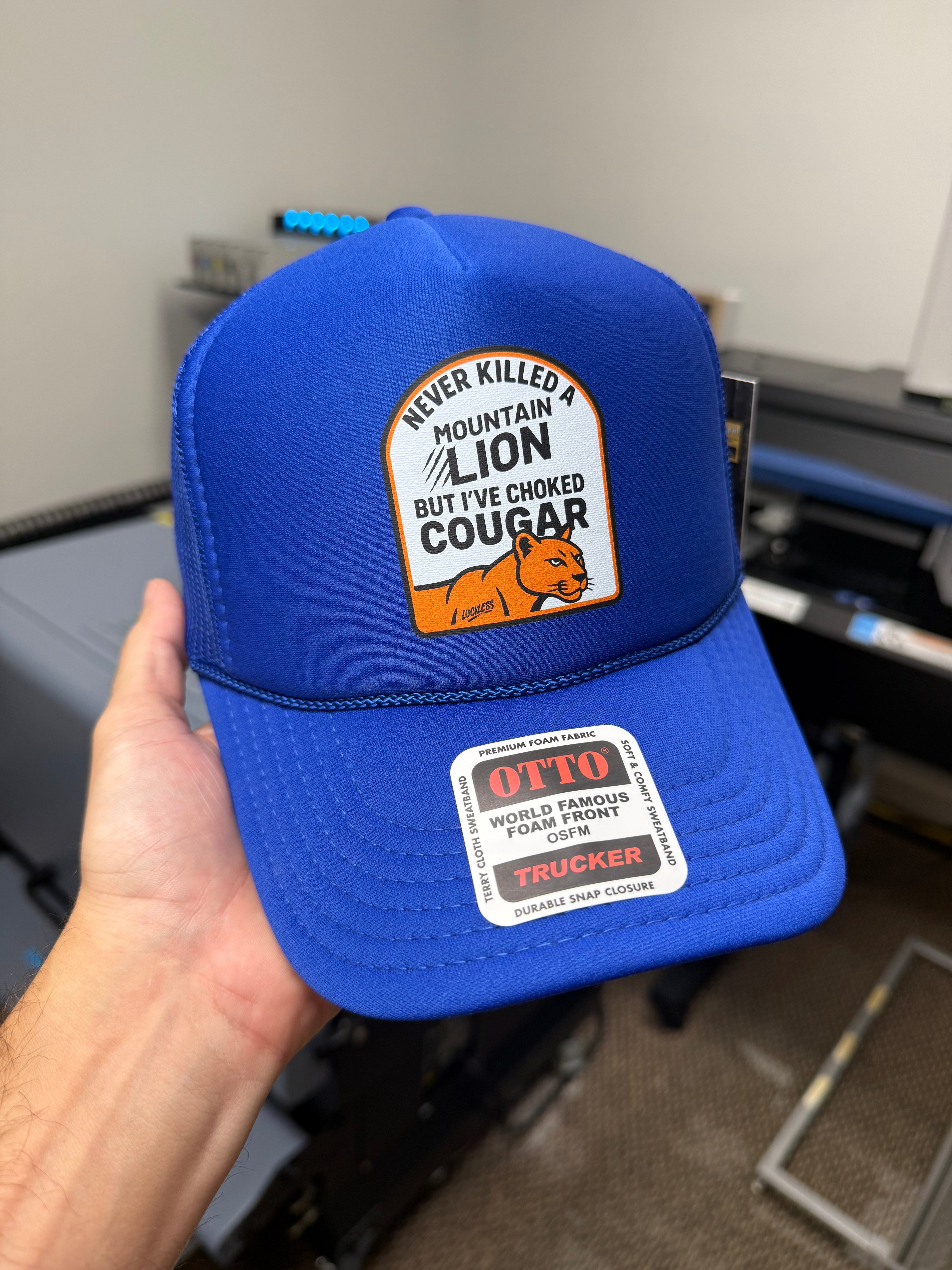 Never Killed A Mountain Lion But I've Choked A Cougar Trucker Hat