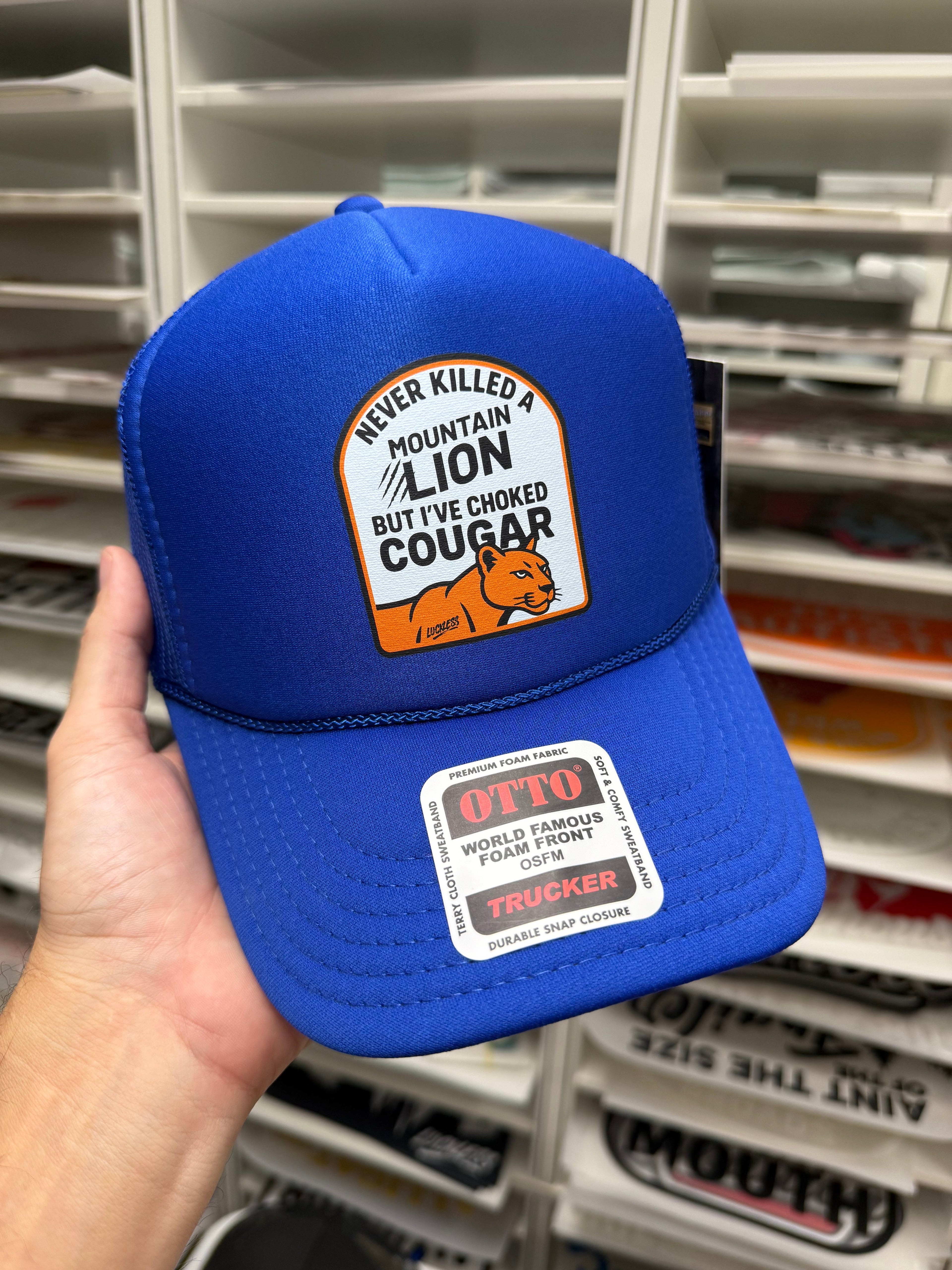 Never Killed A Mountain Lion But I've Choked A Cougar Trucker Hat