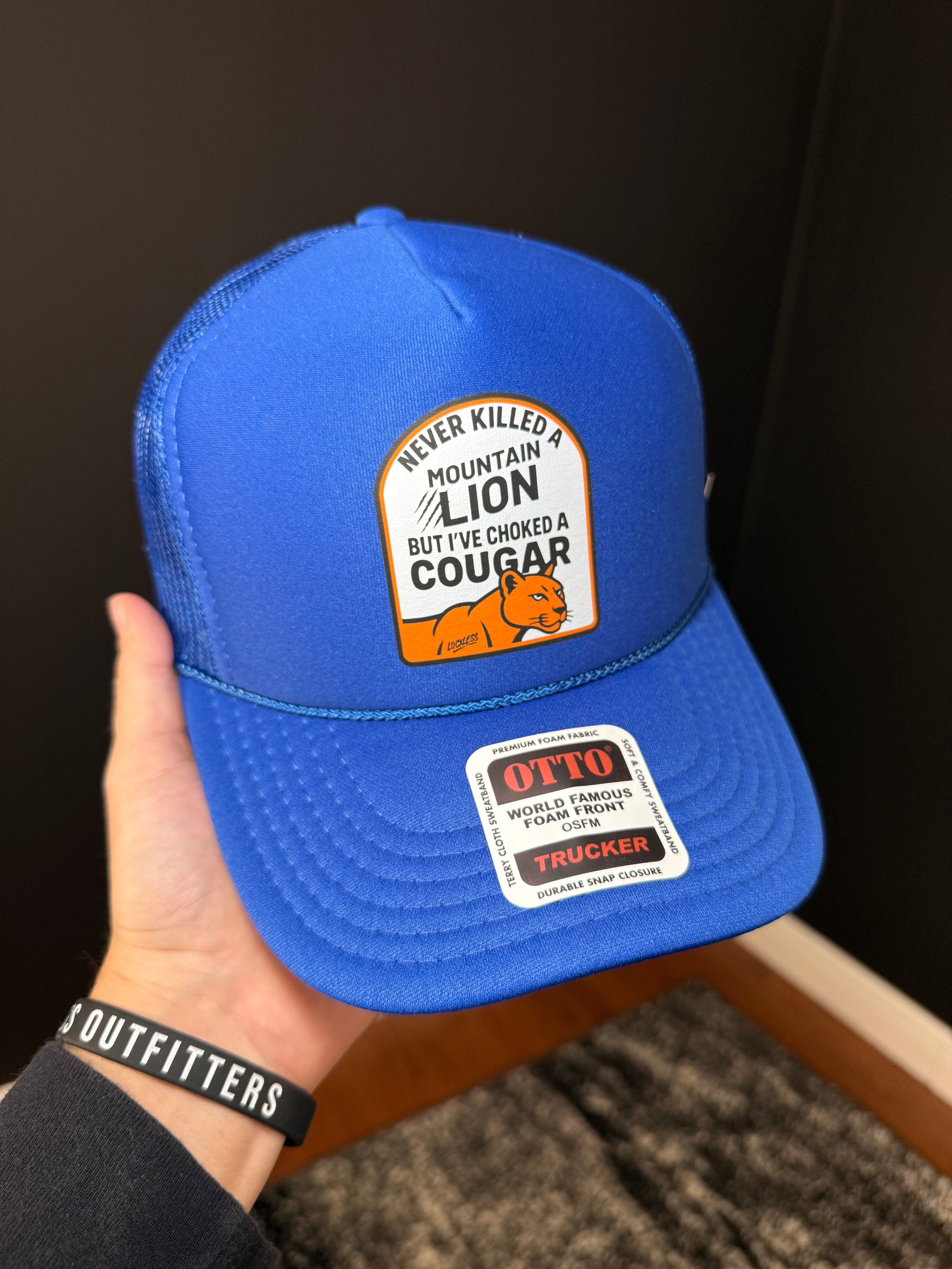 Never Killed A Mountain Lion But I've Choked A Cougar Trucker Hat