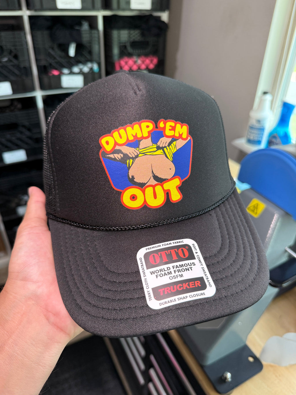 Dump Em Out Trucker Hat