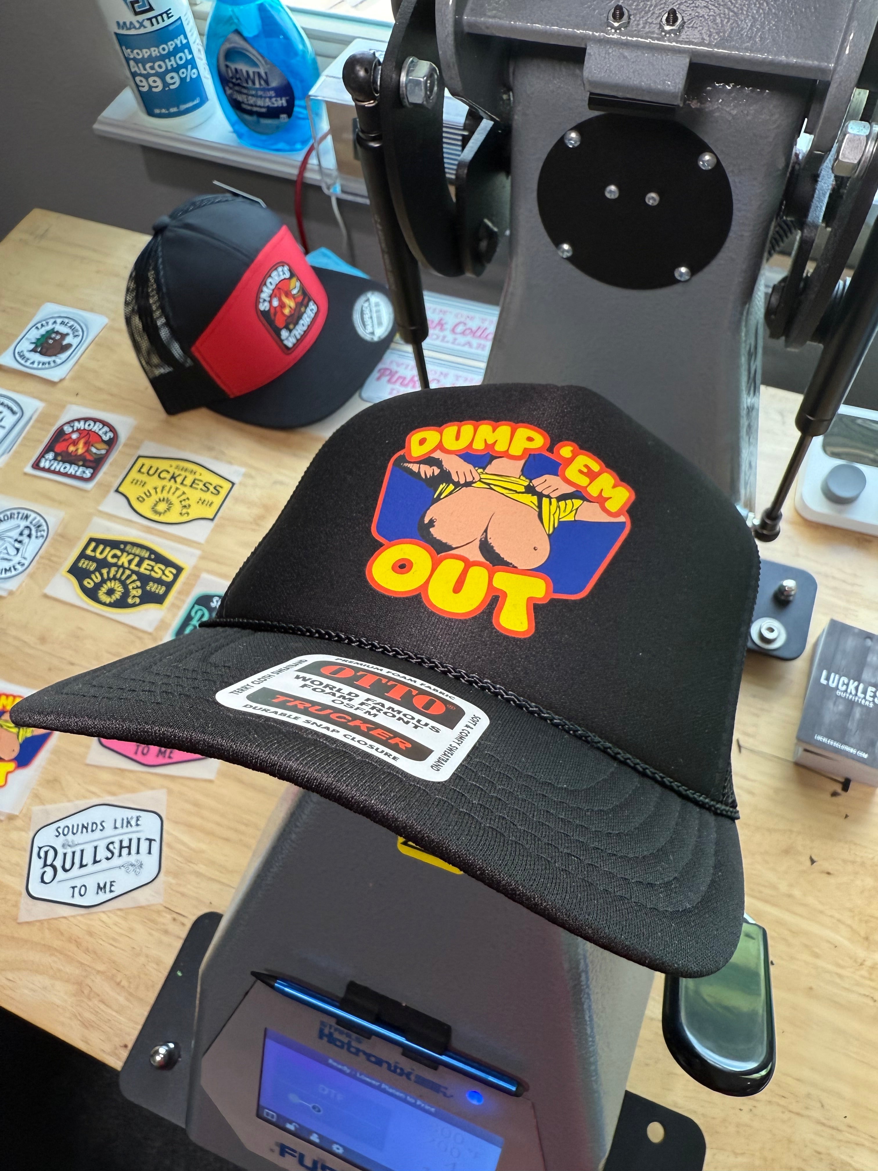 Dump Em Out Trucker Hat