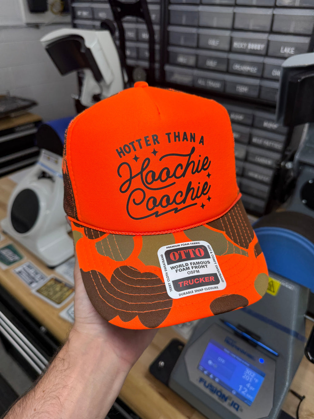 Hotter Than A Hoochie Coochie Trucker Hat