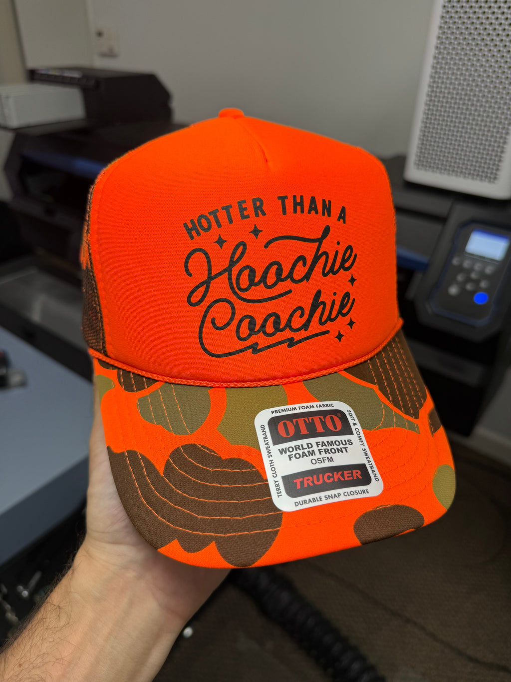 Hotter Than A Hoochie Coochie Trucker Hat