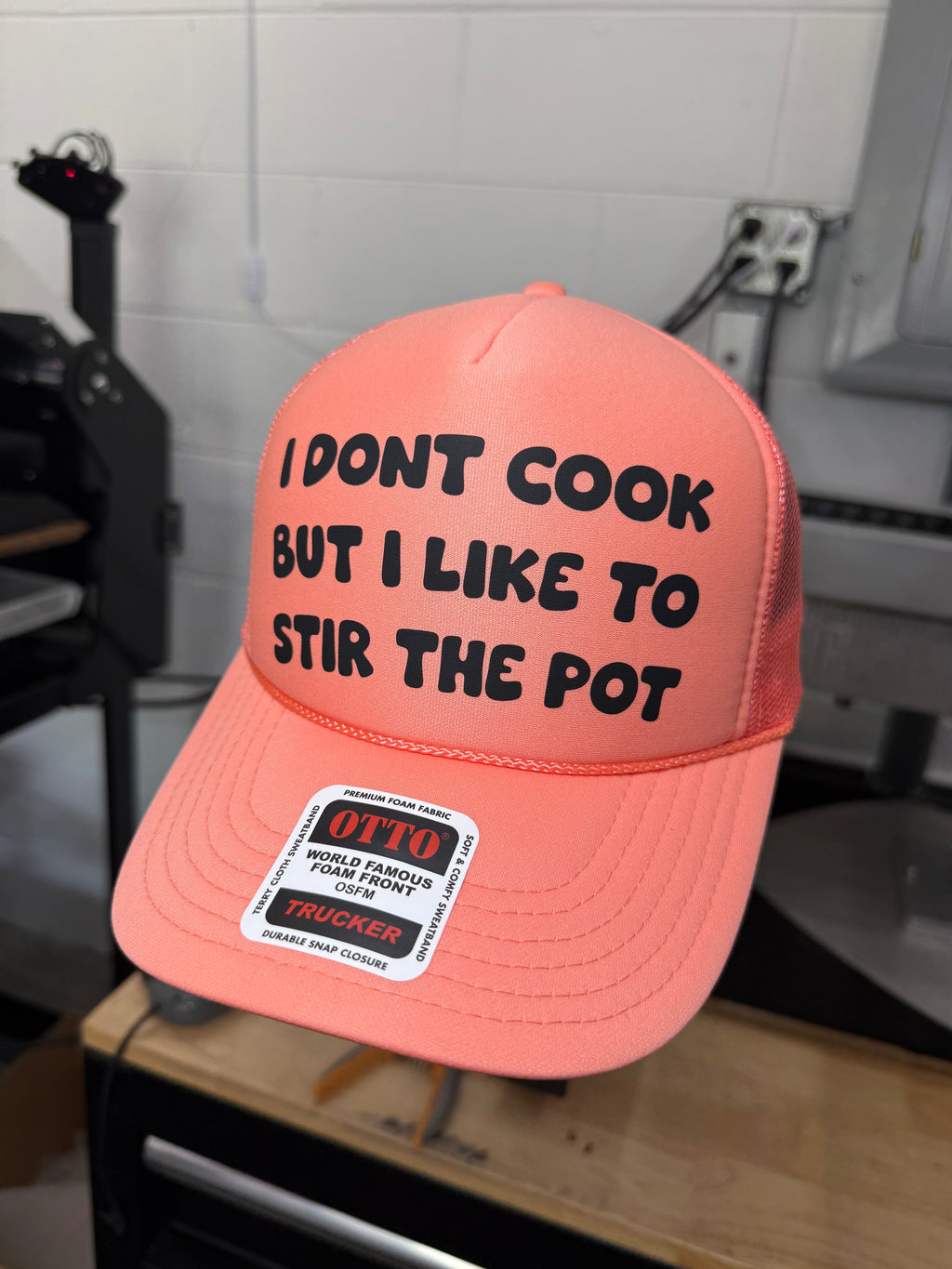 I Don't Cook But I Like to Stir The Pot Trucker Hat