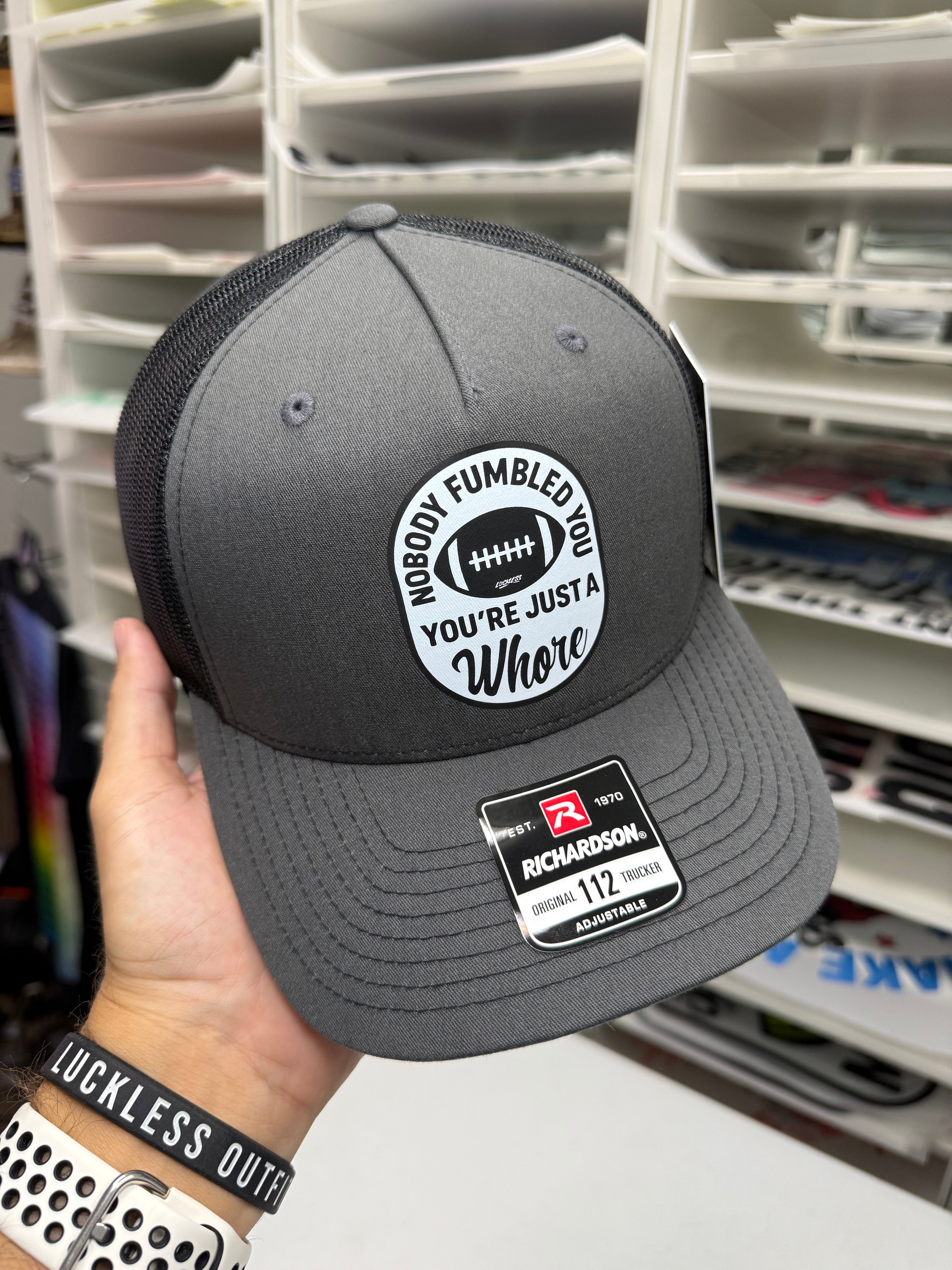 Nobody Fumbled You Trucker Hat