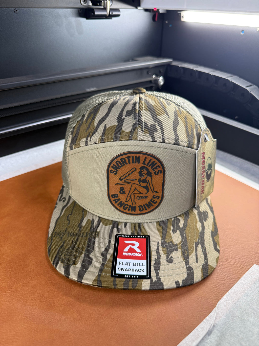 Lines and Dimes | Rawhide Leather Patch Hat Mossy Oak Camo