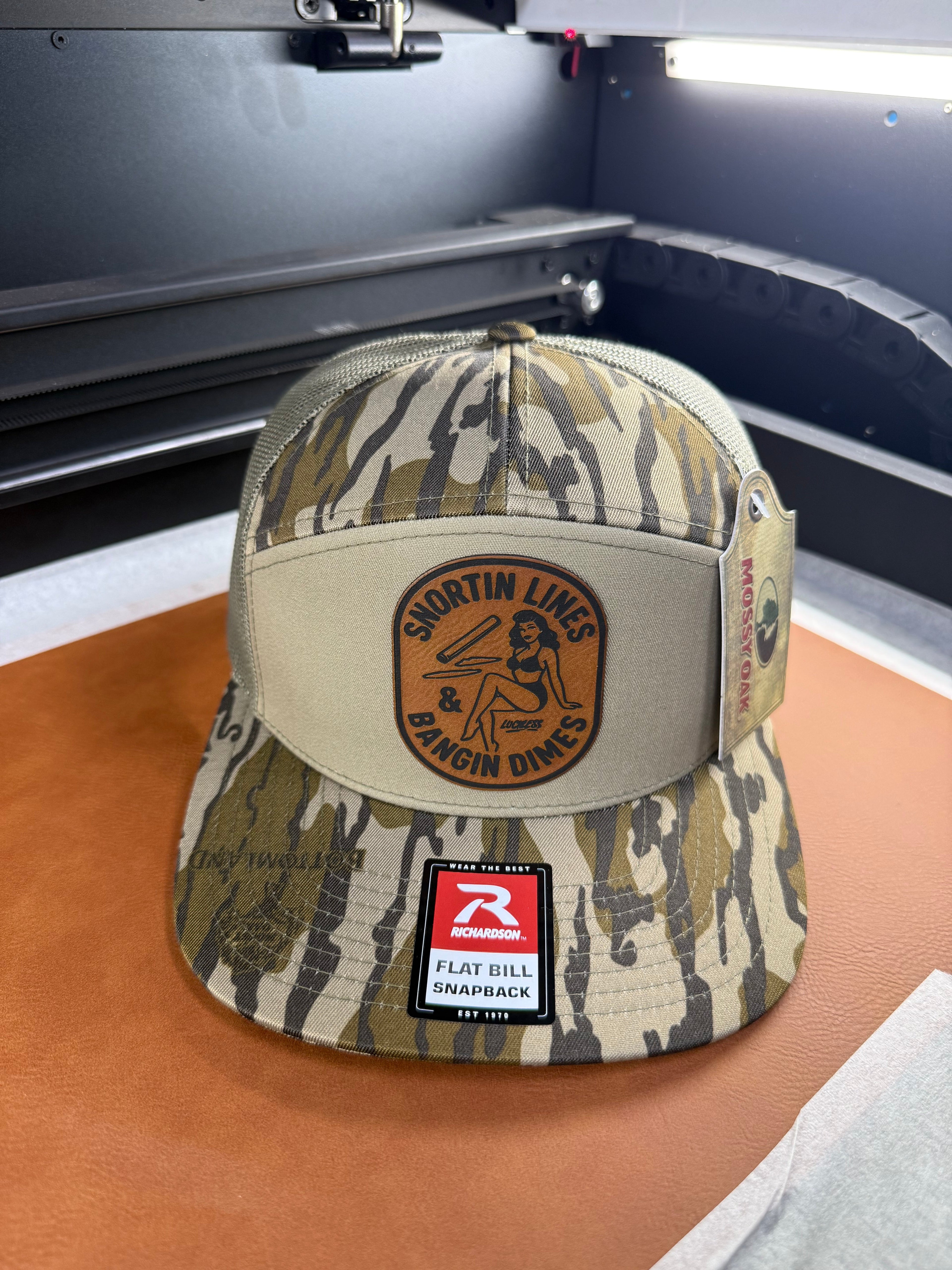 Lines and Dimes | Rawhide Leather Patch Hat Mossy Oak Camo