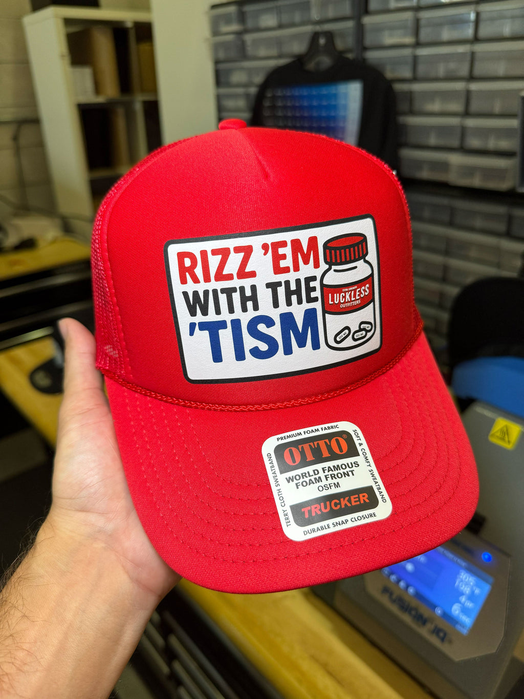 Rizz 'Em With The 'Tism Trucker Hat