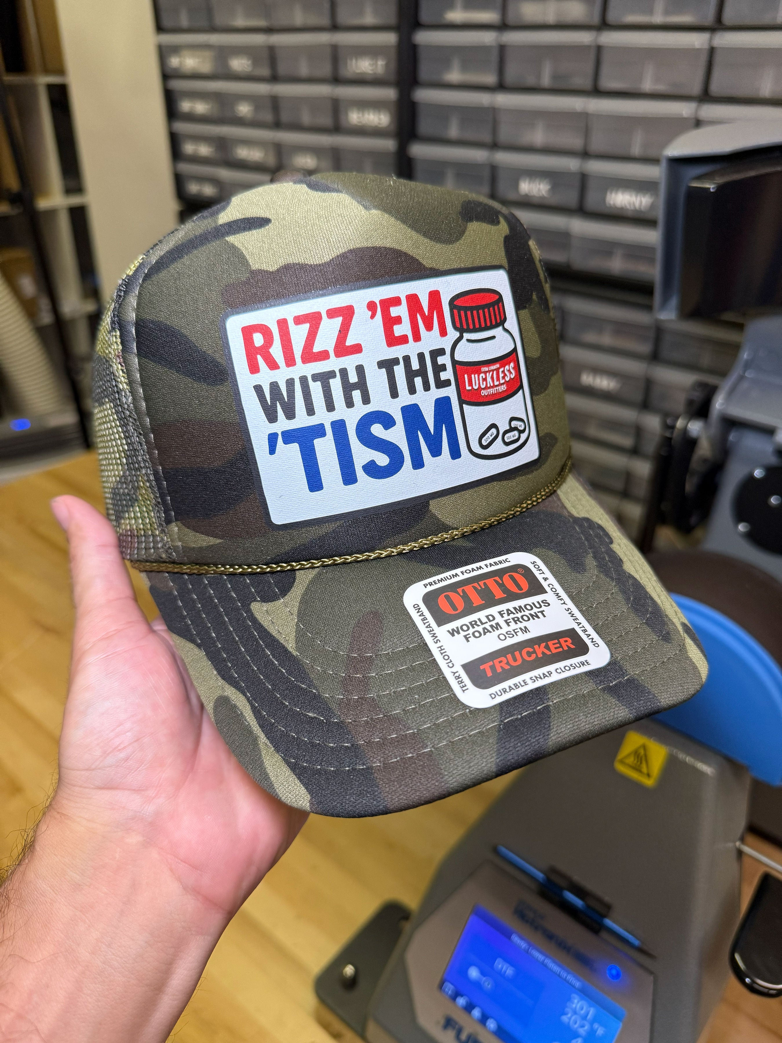 Rizz 'Em With The 'Tism Trucker Hat