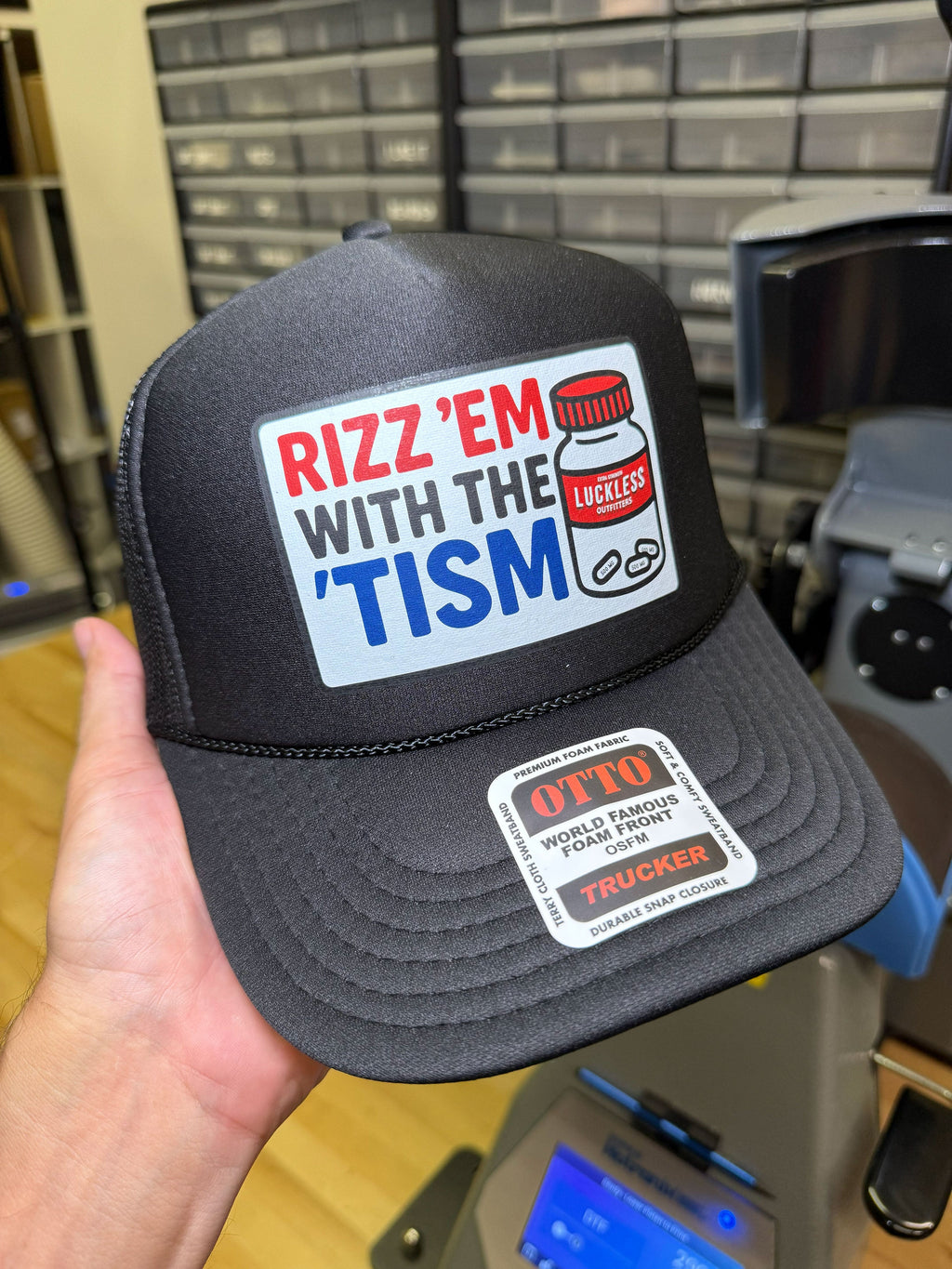 Rizz 'Em With The 'Tism Trucker Hat