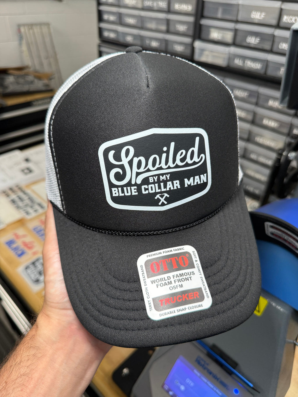 Spoiled By My Blue Collar Man Trucker Hat